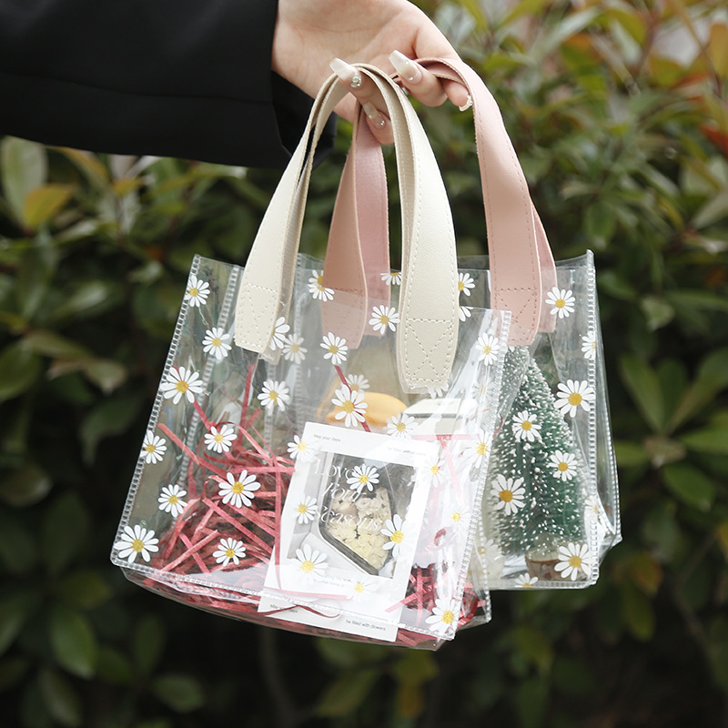 Wholesale of popular Instagram-style pvc transparent handbags, small Daisy shopping bags, plastic wedding candies, souvenirs and wedding gift bags pic 12