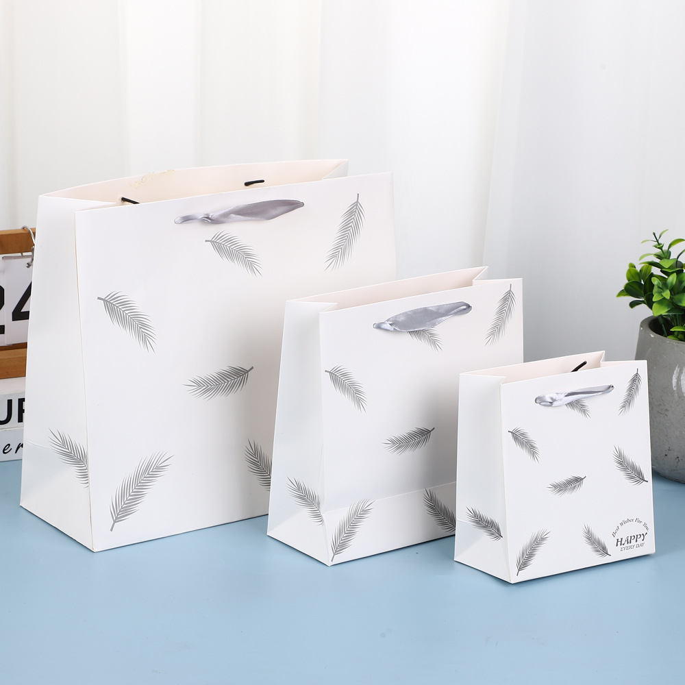 New gift bags, Christmas gift bags, paper bags, feather return gift bags, ribbon clothing bags, New Year gift bags Specification image