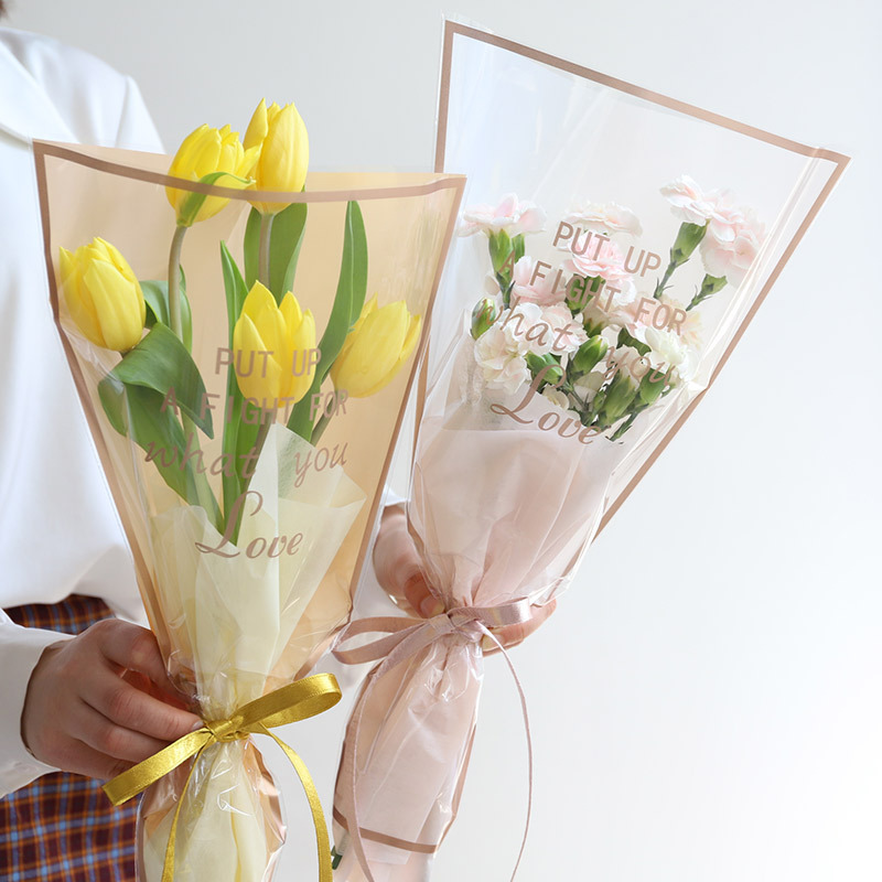 Simple frame Phnom Penh multi-branch bag transparent flower packaging printed word waterproof bouquet packaging Goddess Festival single bouquet packaging Specification drawing