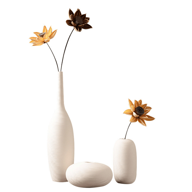 Mini Ceramic Vases arranged on a shelf