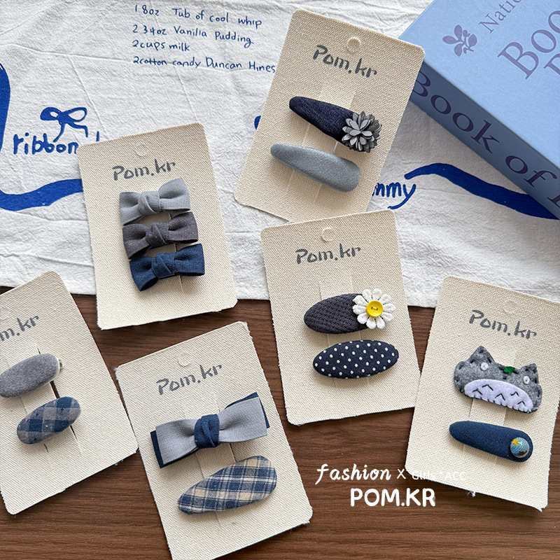 The 2025 Spring new Korean-style girl's side bangs are crushed and released as a basic flower bow hair accessory for girls Application Scenario