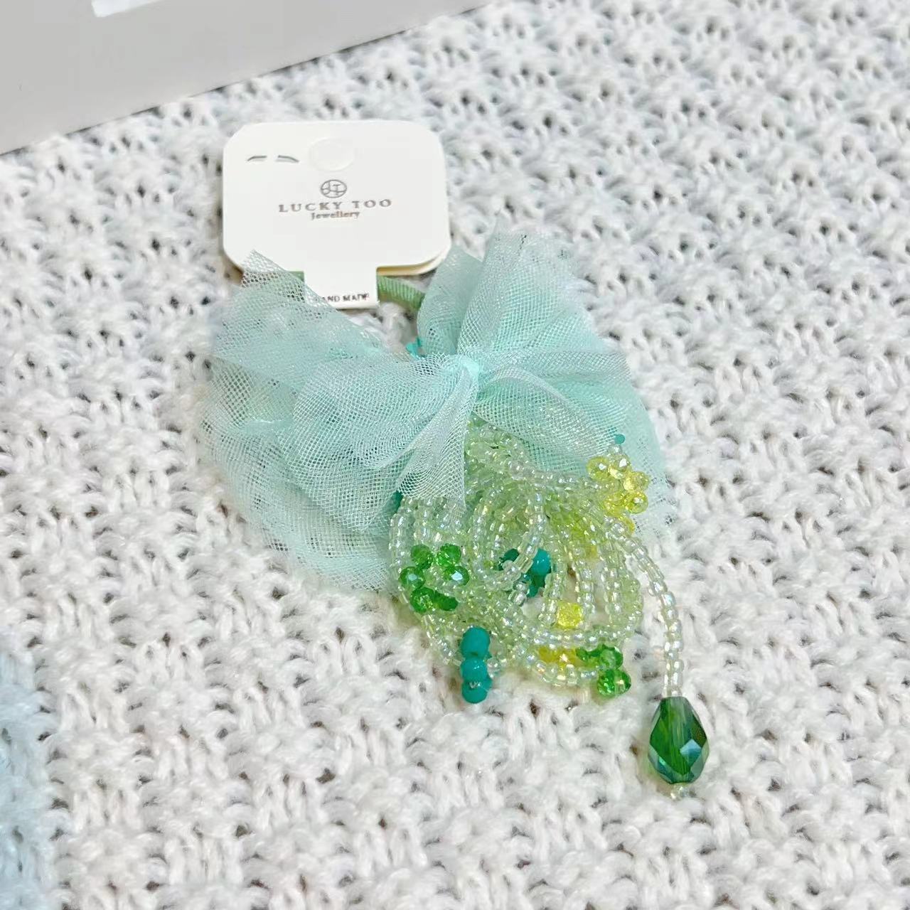Hair Rope Lt10361 Korean Version New Beaded Flower Crystal Flow Su Sa Sa Bow Tie Hair Rope Application Scenario