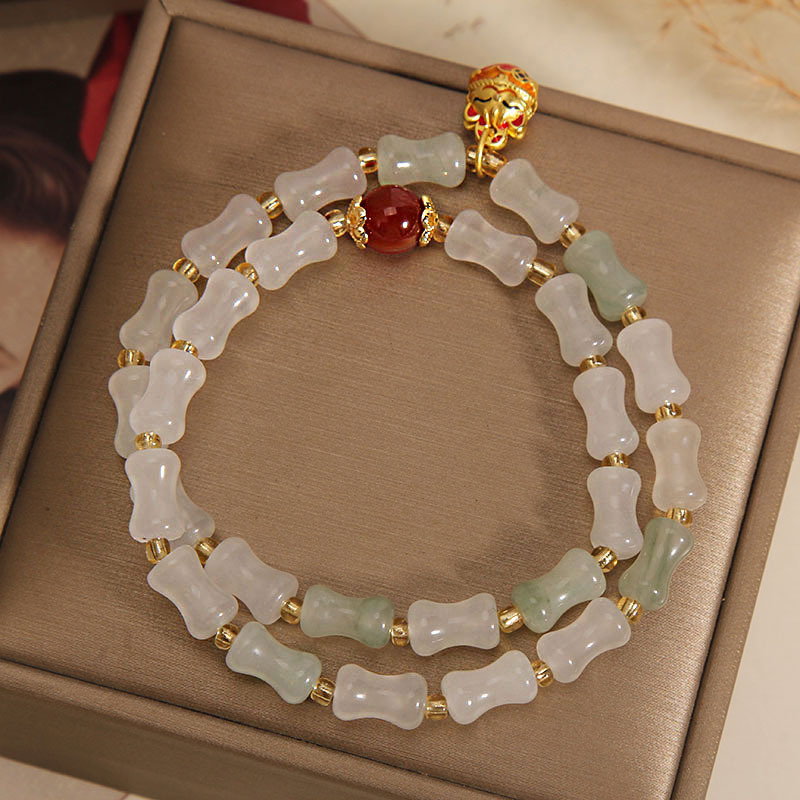 The golden silk jade double-ring bamboo joint bracelet for women on Instagram is a niche, light luxury, and high-end charm that keeps rising. It's a Maneki Neko pendant bracelet Item Picture