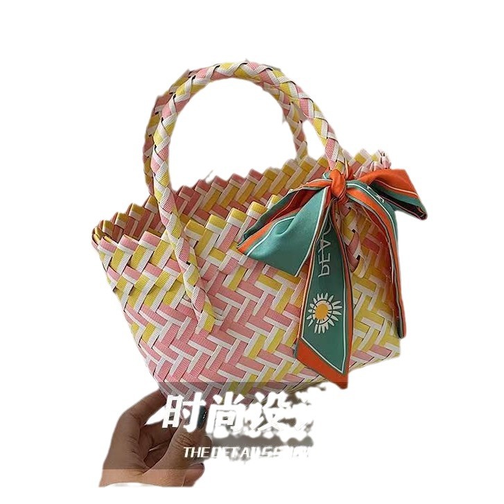 国潮斜编包手工沙滩包手提编织包拍照手礼包口袋包源头厂家手提包白底实物图