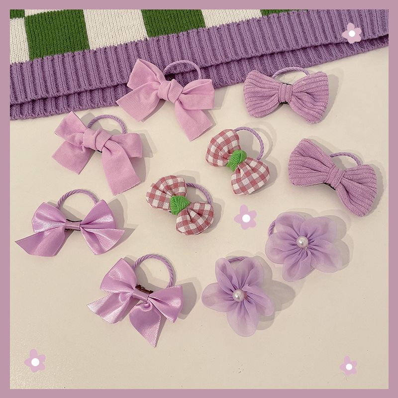 Cute pink hair tie for children. It won't hurt girls' hair. The hair tie is highly elastic and durable. Little girls can tie their hair in a ponytail Application Scenario