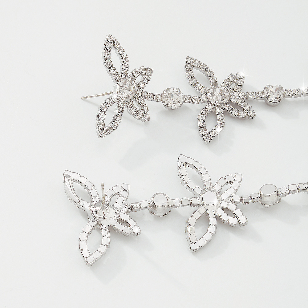 European and American cross-border butterfly tassel earrings, sparkling rhinestones, fashionable and beautiful diamond-encrusted chain earrings, claw chain welded accessories Application Scenario