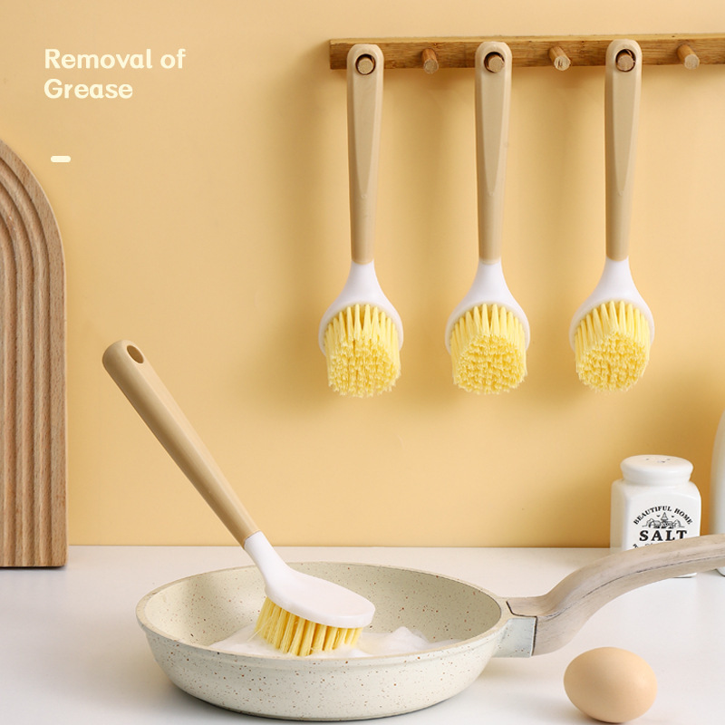 A household kitchen scrubber for washing POTS and dishes, a non-greasy scrubber for washing POTS, a long-handled scrubber for removing dirt and grease, and a cleaning scrubber for POTS details Picture