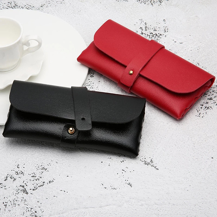 New PU leather soft-padded GM glasses case, fashionable and portable sunglasses case, buckle box, wholesale in stock, cross-border Application Scenario