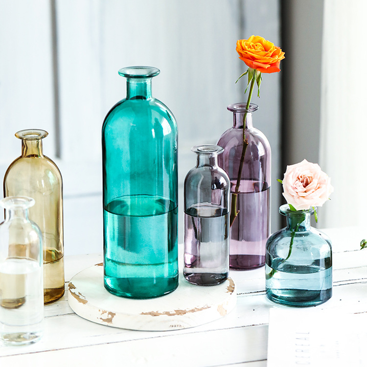 Wholesale of Nordic transparent glass vases, small-mouthed hydroponic fresh flower tables, dried flowers, colored flower arrangement vessels and decorative ornaments