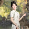The new Chinese-style short-sleeved daily modified green cheongsam long style, featuring the "National Trend Lucky Bamboo" for the college entrance examination, has achieved a successful start details Picture