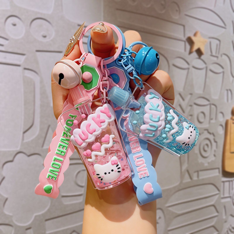 网红入油漂浮流沙瓶夜光KT猫钥匙扣可爱情侣小挂件汽车钥匙链批发
