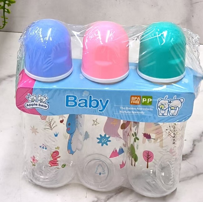 A set of three of the best-selling baby bottles made of pp material with cute and fun patterns for wholesale trade, including silicone pacifiers and cups full figure