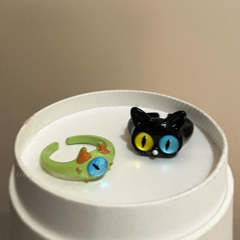 A quirky black cat monster ring, a fashionable and unique design for women on Instagram, and a tail ring for best friends and couples details Picture