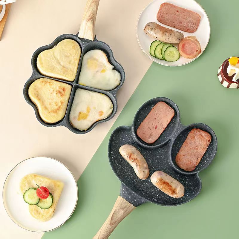 A home-use tourmaline heart-shaped four-hole egg-frying breakfast pan