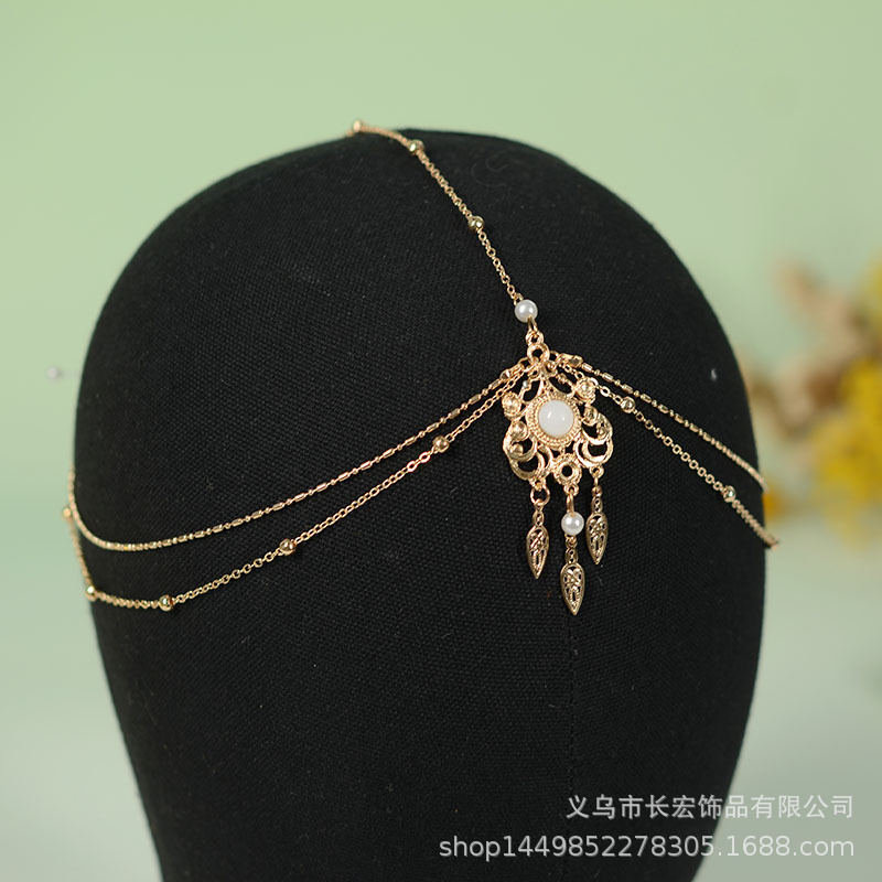 Exotic Western region headdress forehead chain forehead pendant red fringe hair crown Dunhuang Princess dancer jewelry