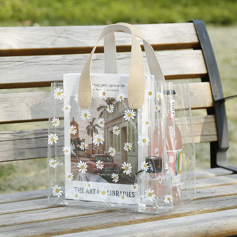 Wholesale of popular Instagram-style pvc transparent handbags, small Daisy shopping bags, plastic wedding candies, souvenirs and wedding gift bags pic 2