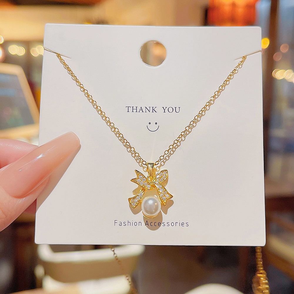 Temperament Bow Pearl Necklace Women All Match High-Grade Niche Design Network Red Accessories 2024 New Collarbone Chain full figure
