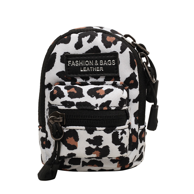 Korean mini children's bags are popular in foreign trade. Leopard print girls' single-shoulder crossbody bags, outdoor travel headphones, bag mouth red envelopes Item Picture