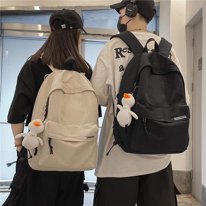 Men's simple large-capacity travel backpack, women's casual Japanese-style schoolbag for junior high school, senior high school and college students, men's Application Scenario