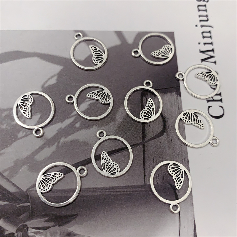 DIY zinc alloy jewelry accessories, hollowed-out circular butterfly pendants, earrings, necklaces, beaded bracelets, tassels, pendants details Picture