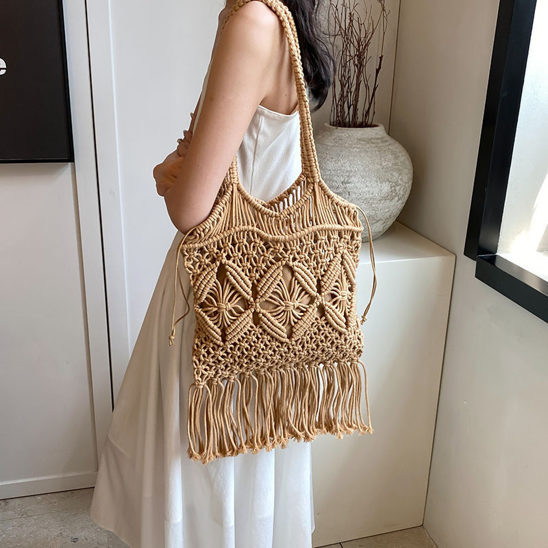 Cross-border wholesale handmade cotton thread woven bag 2025 new style versatile single-shoulder armpit bag, straw woven bag, hollowed-out beach bag