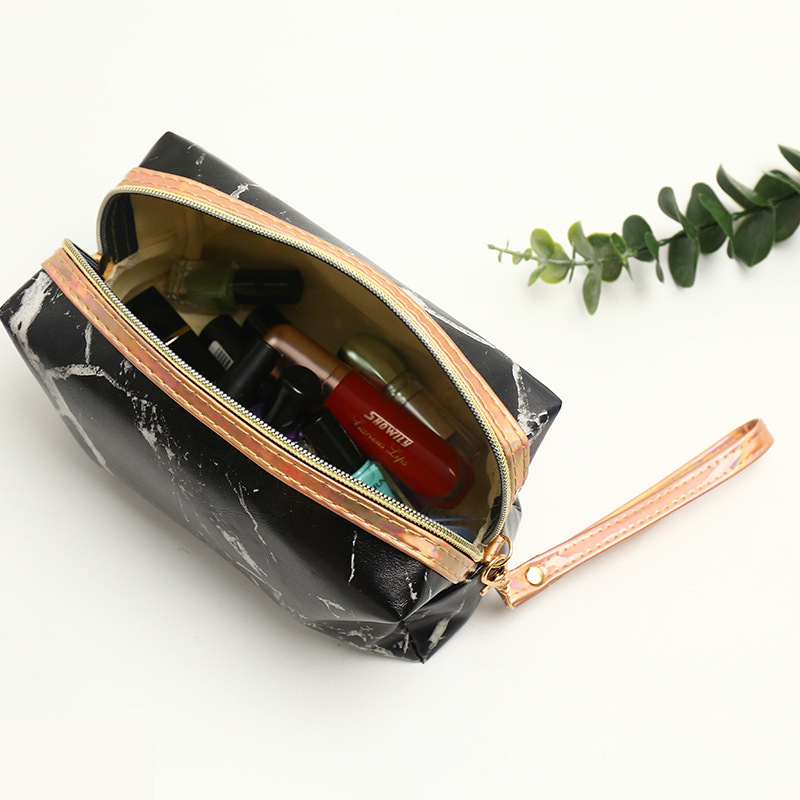 Cross-border best-selling marble-patterned PU cosmetic bag, multi-functional travel portable storage bag, water-repellent fashionable toiletry bag Application Scenario