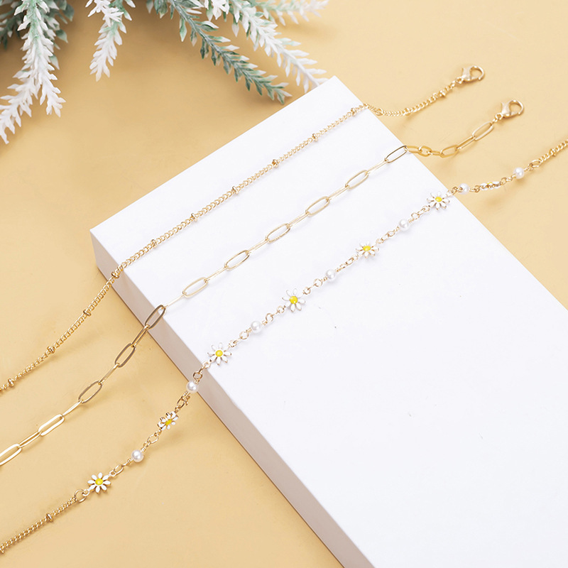 Design sense small Daisy pearl necklace female INS wind light luxury small fold wear clavicle chain anklet set tidal wholesale Application Scenario