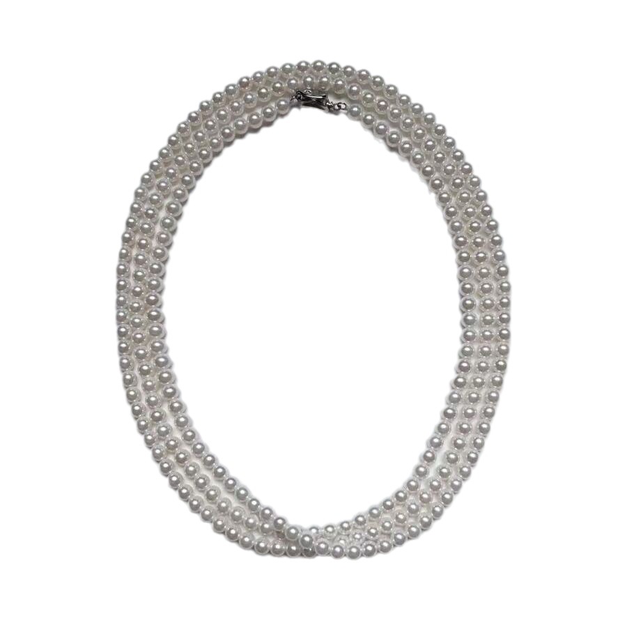 The fashionable Shijia pearl necklace exudes a sense of light luxury and sophistication. It features a multi-layered French retro long sweater chain as a women's accessory Item Picture