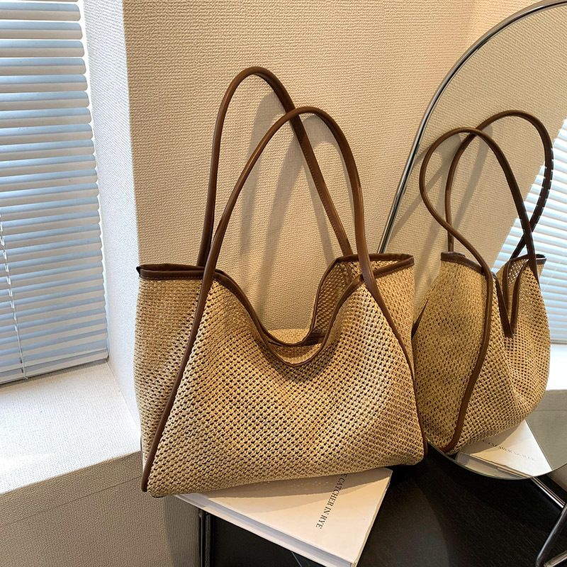 今年流行大容量草编包包女2023新款时尚通勤单肩包夏天编织水桶包