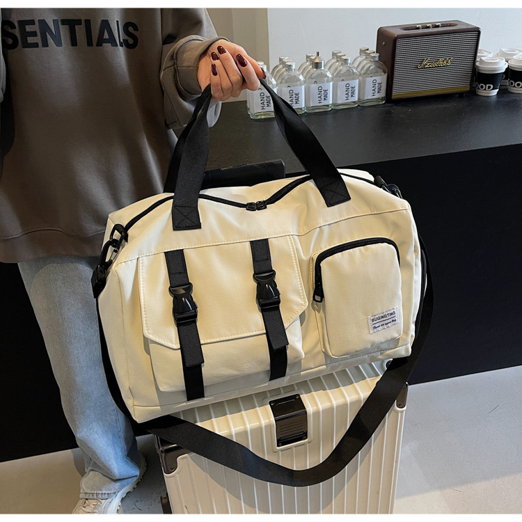 Men's large-capacity waterproof luggage bag, hand-held luggage bag Item Picture