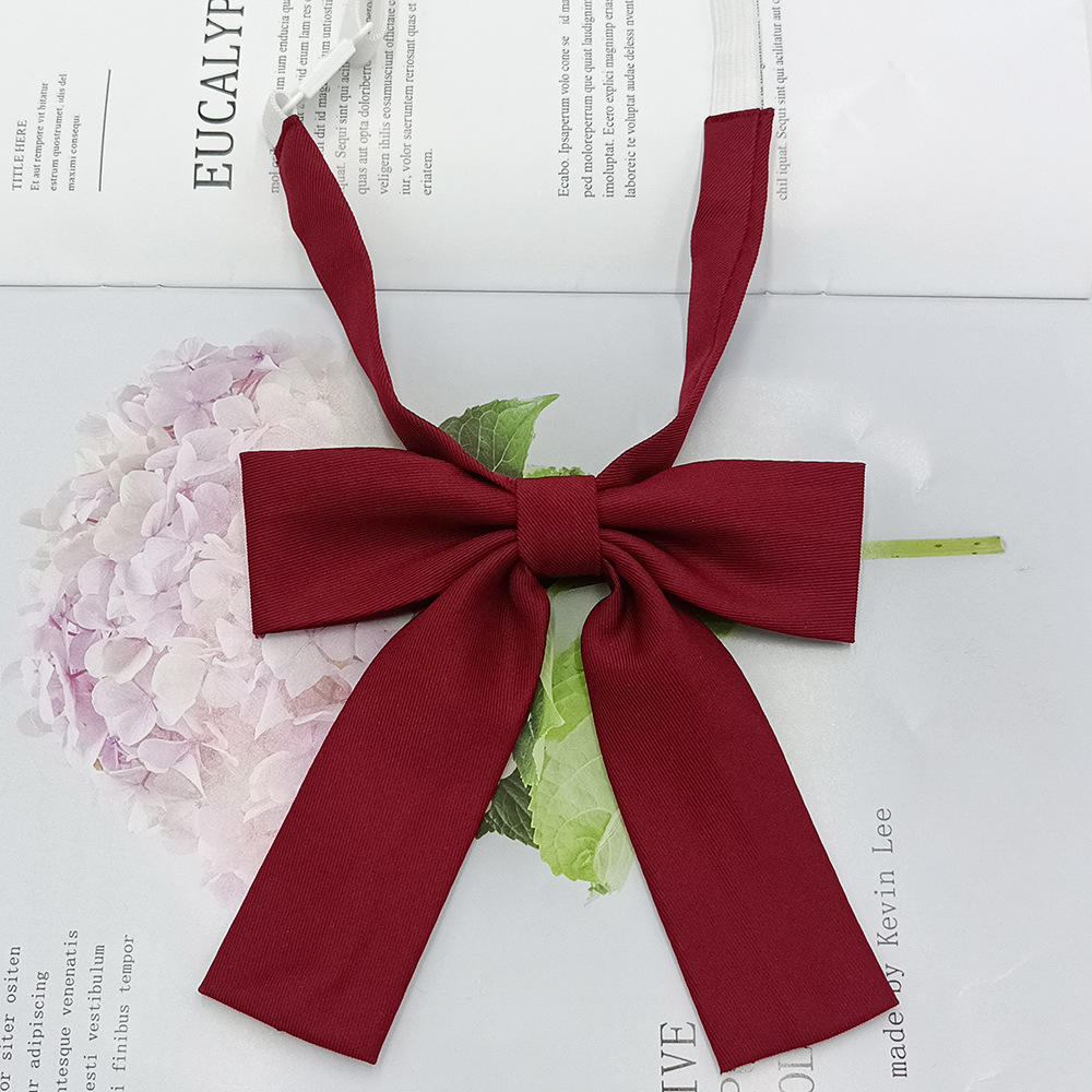 The manufacturer has a solid color short long-handled bow tie for women, a new Korean-style fashionable girl's bow tie with a short handle and a ribbon in stock Application Scenario