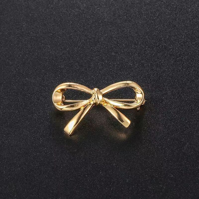 Korean-style bow neckline brooch, anti-glare women's versatile sweater suit pin, niche design clothing accessory details Picture