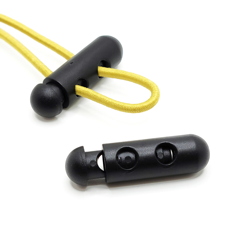 Capsule-shaped plastic spring buckle, special-shaped elastic band rope buckle, cylindrical double-hole adjustable button, black pig nose buckle Application Scenario
