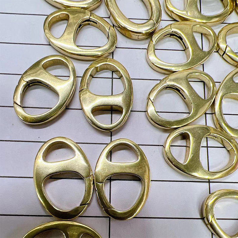 Copper-plated real gold color-preserving oval figure-eight button DIY jewelry bracelet necklace spring button accessories manufacturer wholesale