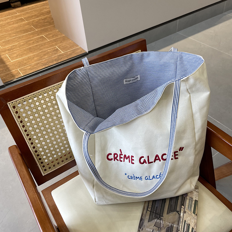 新款正反双面条纹单肩包大容量托特包高级质感刺绣学生帆布通勤包
