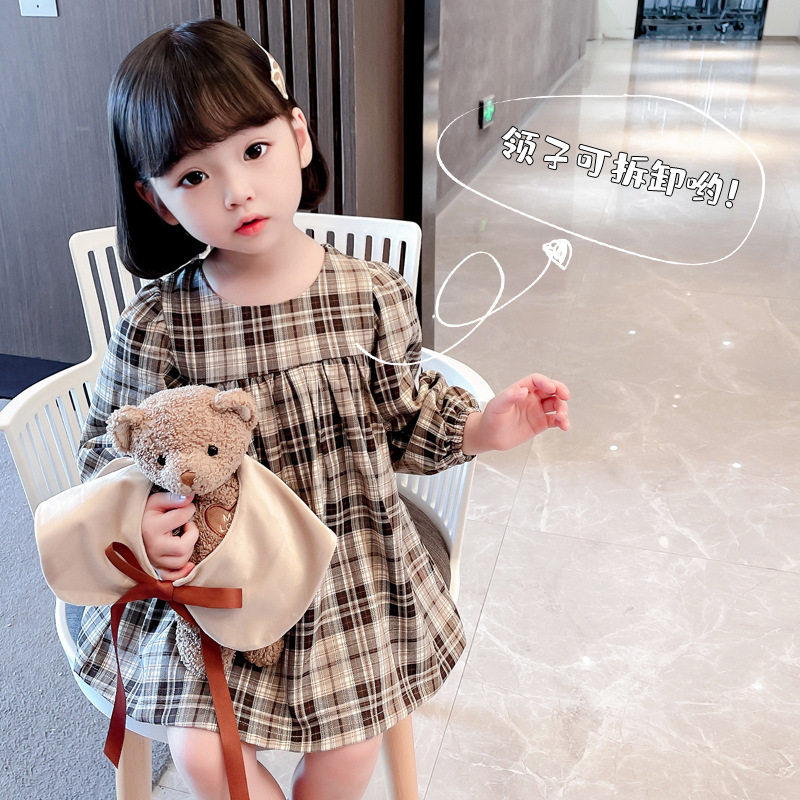 The 2022 new Korean-style checkered dress for fashionable girls is a simple and trendy dress for children. It's a trendy autumn dress for girls details Picture