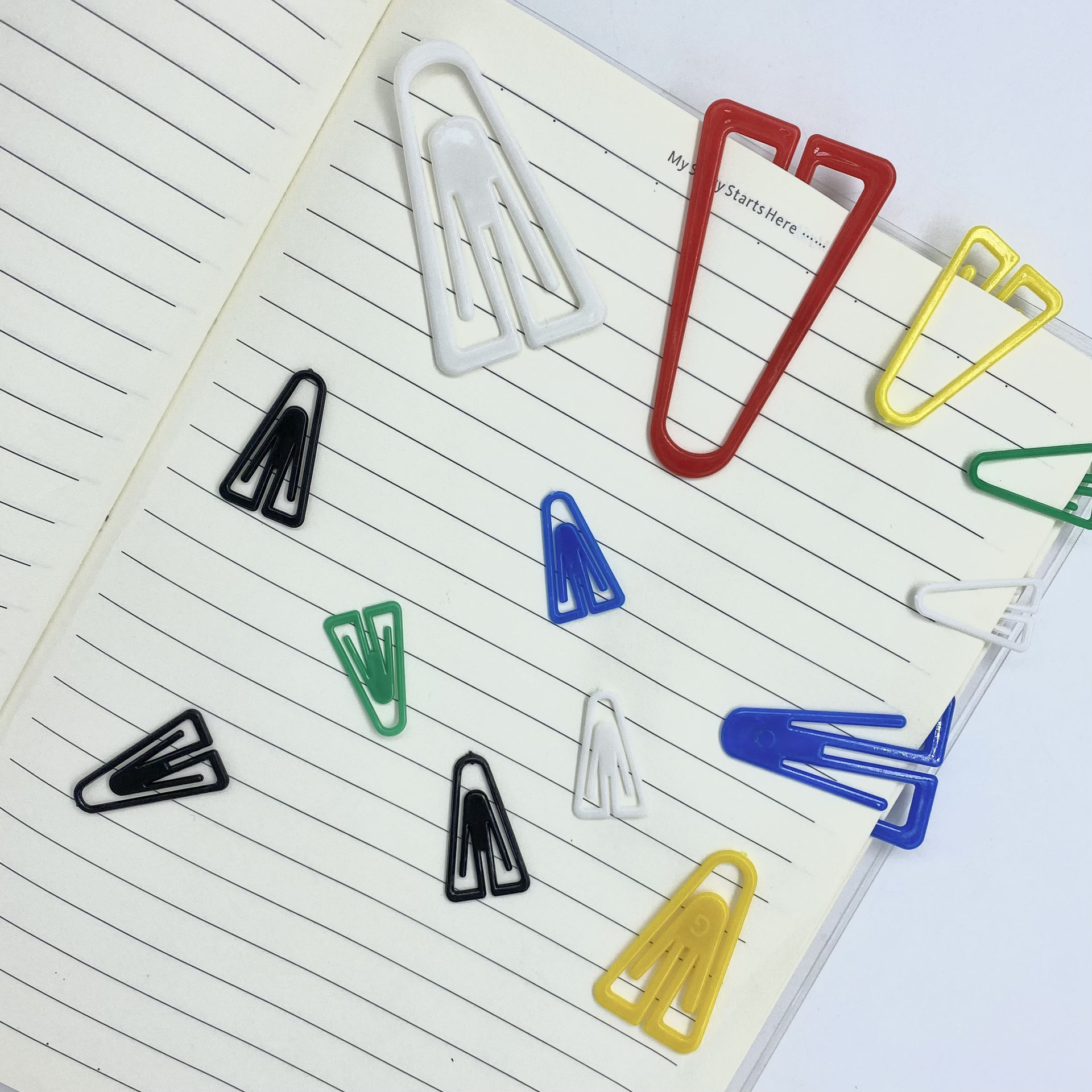 Wholesale of all-plastic triangular paper clips, paper clips, office stationery, bookmarks, creative irregular-shaped paper clips, and colored paper clips