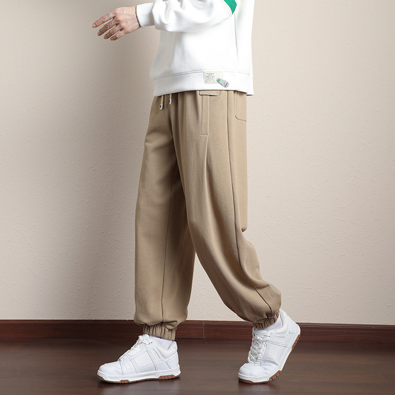Pantalón hombre nueva marca de moda versátil pantalón deportivo casual línea de día moda tendencia paquete de pies pantalones harun Specification image