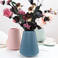北欧风塑料花瓶创意干湿花插花容器现代简约家居仿陶瓷装饰品摆件图
