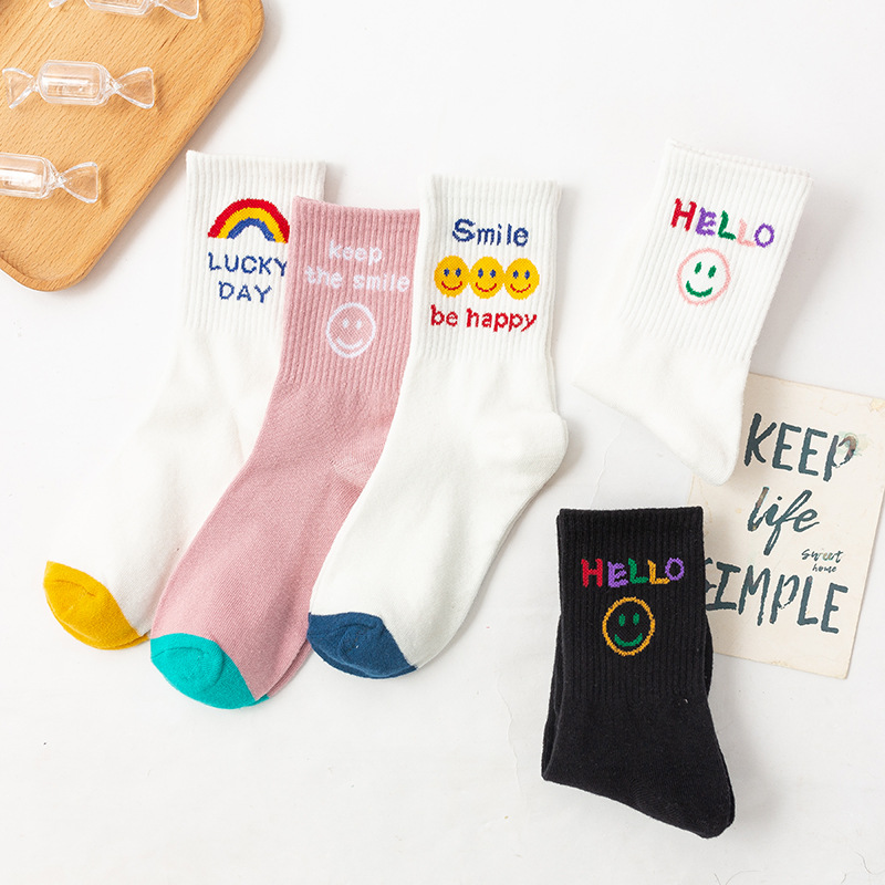Women's mid-calf trendy brand spring and summer Japanese-style smiling black and white long calf socks, pure cotton versatile couple basketball sports socks