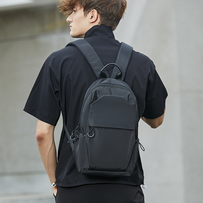 National trend mini small backpacks for men, lightweight student schoolbags, outdoor sports and travel small backpacks for men and women
