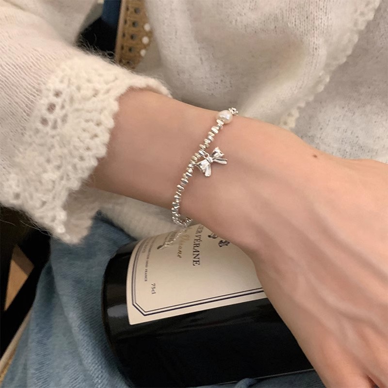 2023 New Broken Silver Pearl Bracelet Female Simple Cold Wind Bow Bracelet Niche Design Boudoir Hand Jewelry Specification drawing
