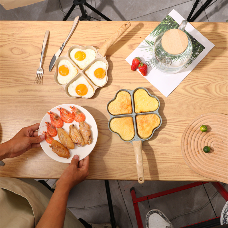New creative heart-shaped baking pan, non-stick four-hole egg burger frying pan, induction cooker, universal mini egg frying pan wholesale details Picture