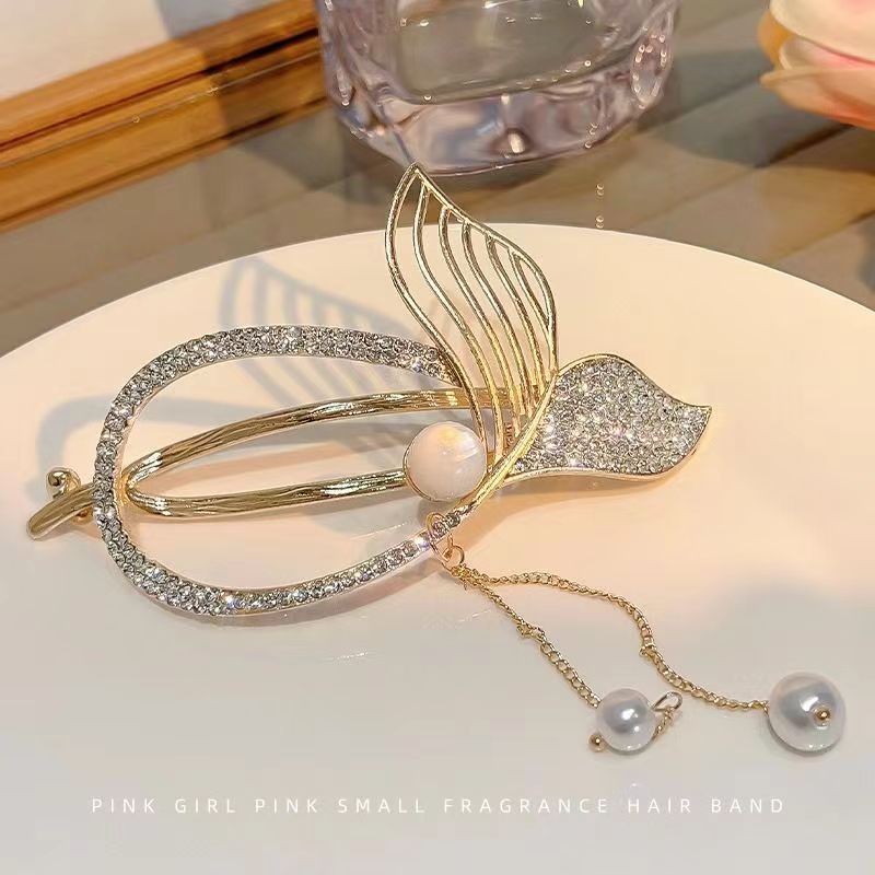 The new high-end tassel fishtail twist clip hair clip, back head grip clip, high-end updo hair clip and straight clip from the national trend series details Picture