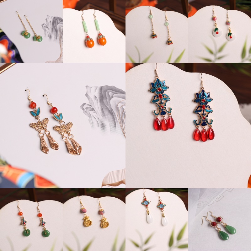 New Chinese-style national trend retro jewelry enamel niche 925 ear needle magnolia flower imitation Hetian jade ancient-style earrings