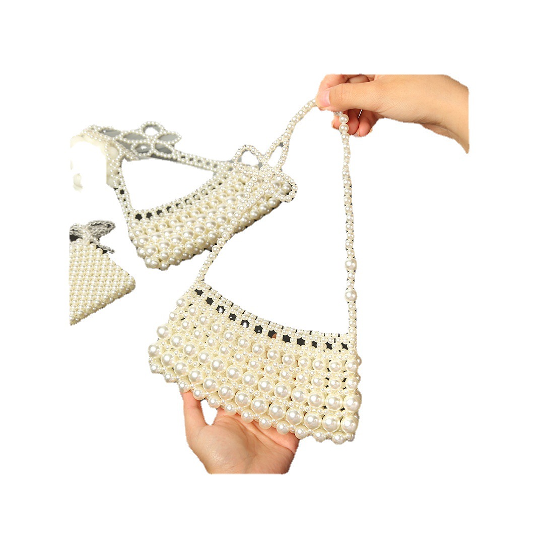 A new cross-border bestseller crossbody bag, an Instagram influencer woven hollowed-out beaded handbag, a French retro pearl dinner bag Item Picture