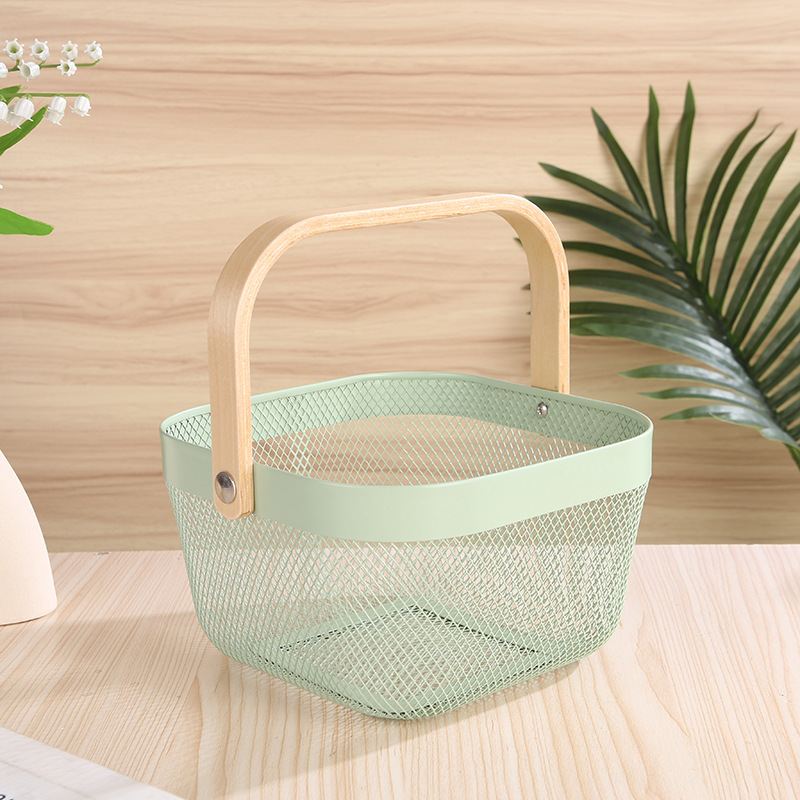 Wholesale of gift baskets with wooden handles, ironwork storage baskets, hollowed-out household fruit and vegetable baskets, and outdoor portable vegetable baskets details Picture