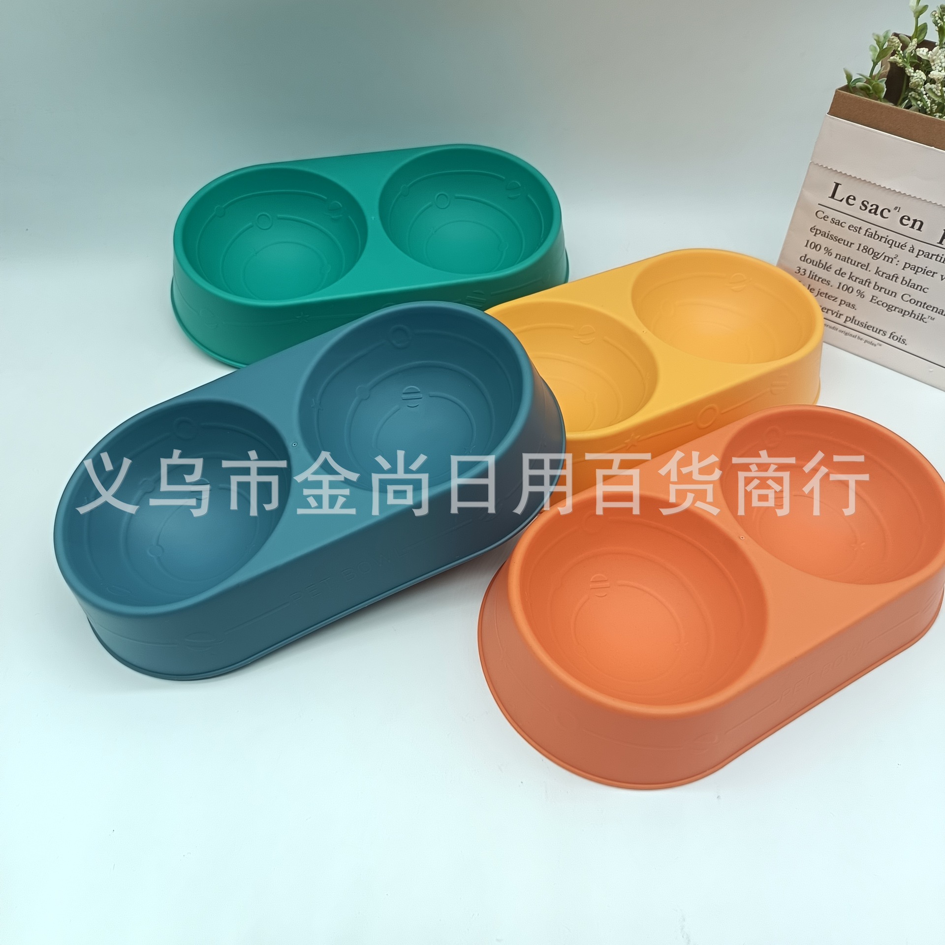 Wholesale of cross-border candy-colored pet oval double bowls, cat water bowls, plastic dog bowls, anti-knock dog basins, and pet supplies full figure