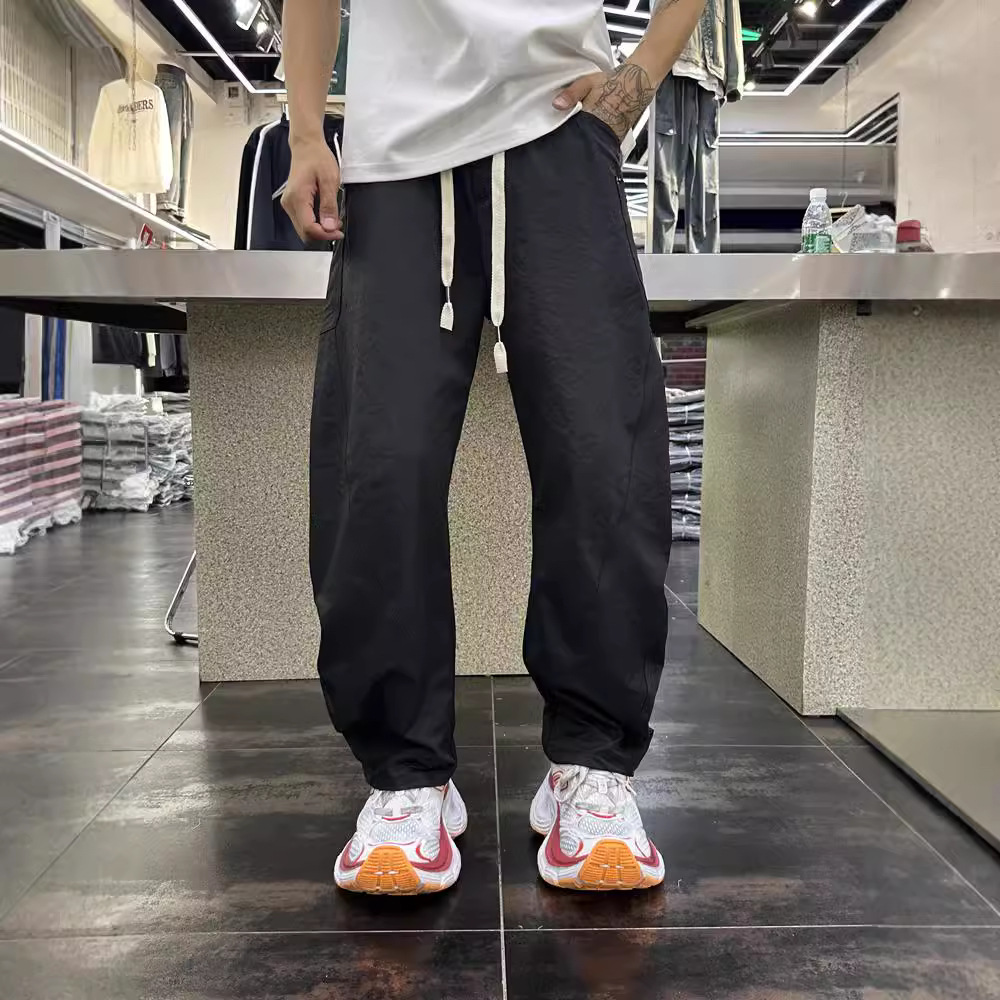 Spring and autumn pants: Men's simple solid color design casual pants, men's high-end style large pocket wide-leg curved knife pants Item Picture