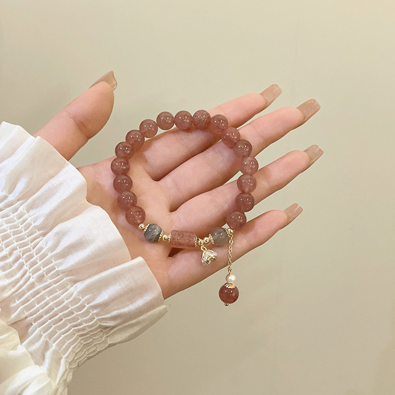 Cute pink strawberry crystal beaded bracelet, light luxury and niche design, high-end flower pendant bracelet wholesale details Picture
